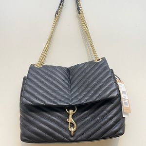 Black classic bag. Worn out a couple of times. Fits a lot of things.